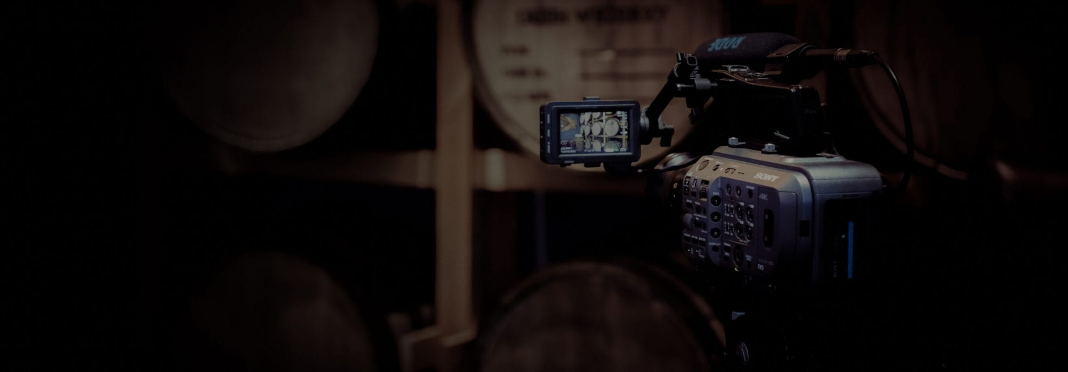 camera filming the best luxury whiskey to invest in